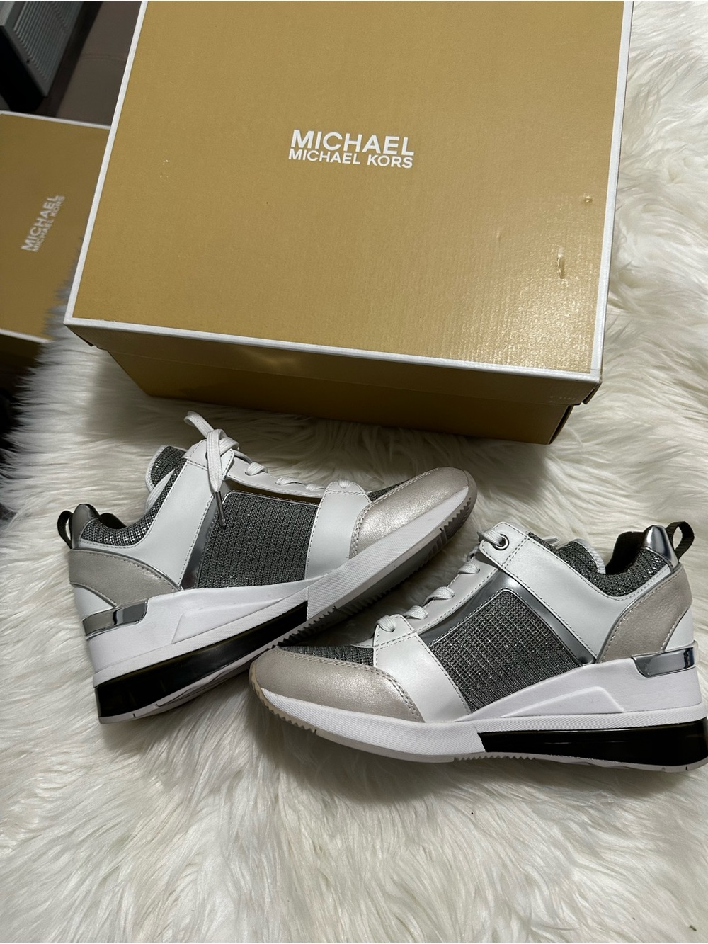 Michael Kors women’s White, Silver & Gray Wedge Sneakers
